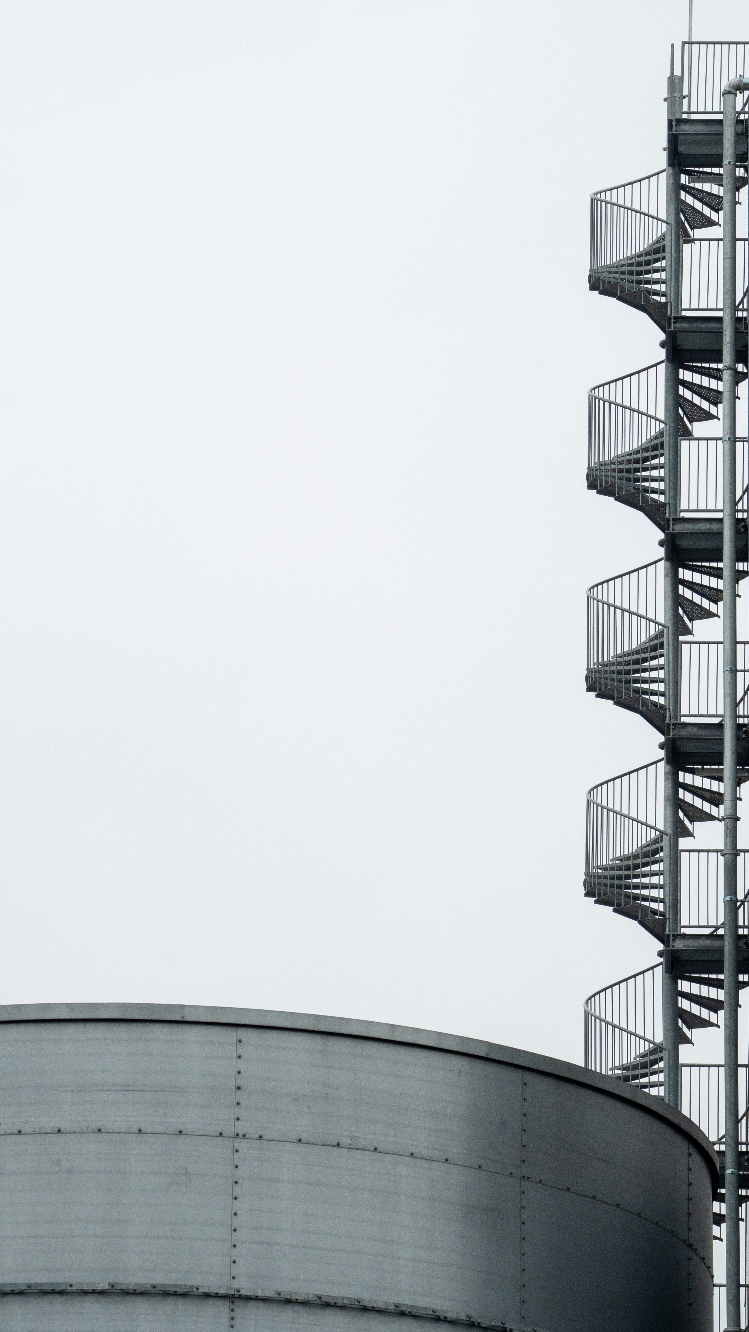 white spiral stairs with white background